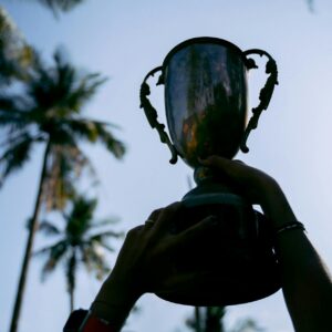 a person holding a trophy